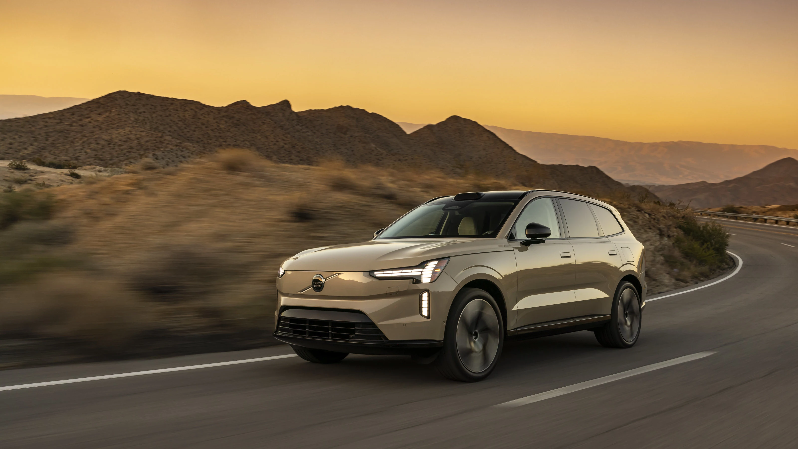 EV driving along a coastline